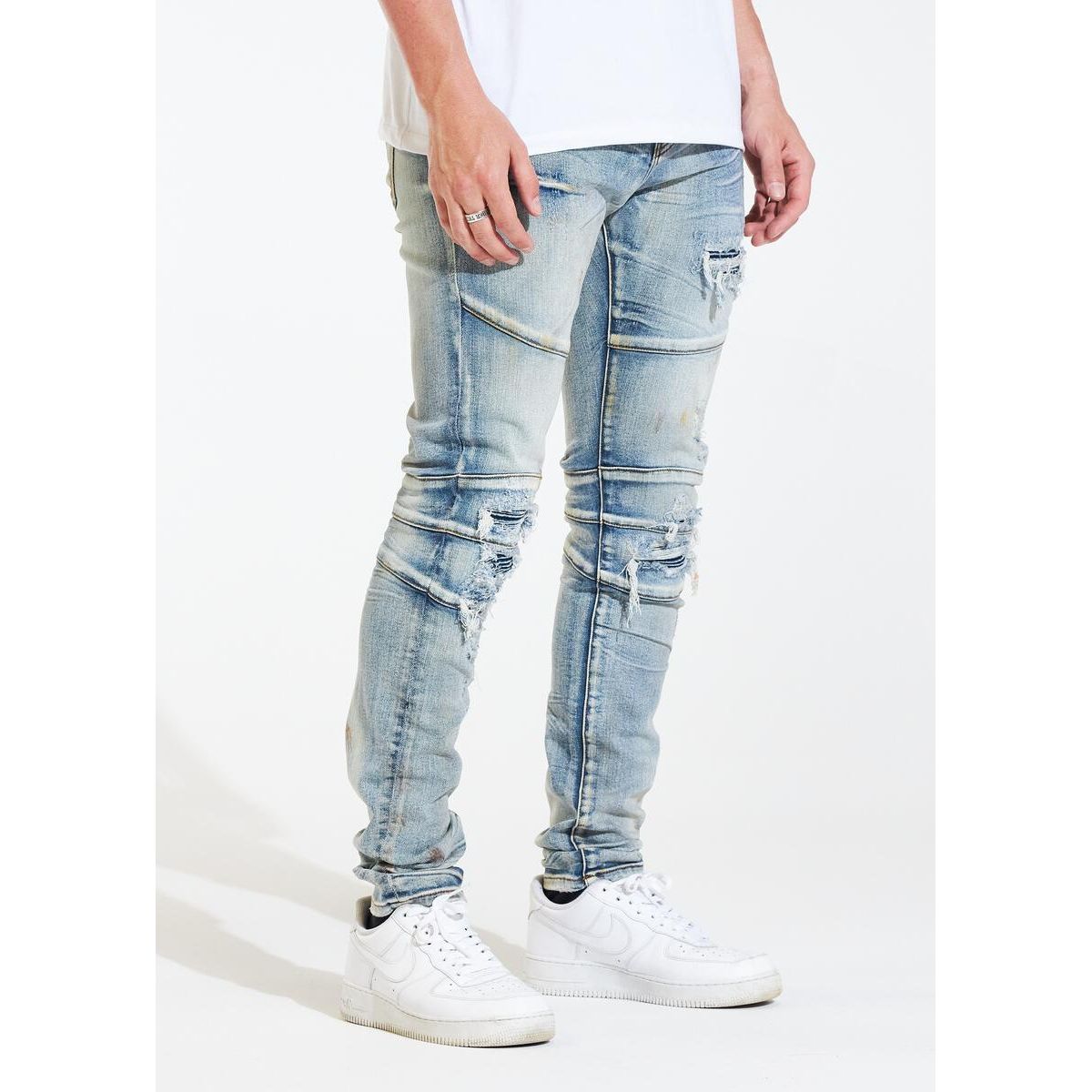 Close-up image of Crysp Denim Montana Blue Ripped Biker Jeans (CRYSPHOL21-9) showcasing distressed details and stylish design for men's fashion