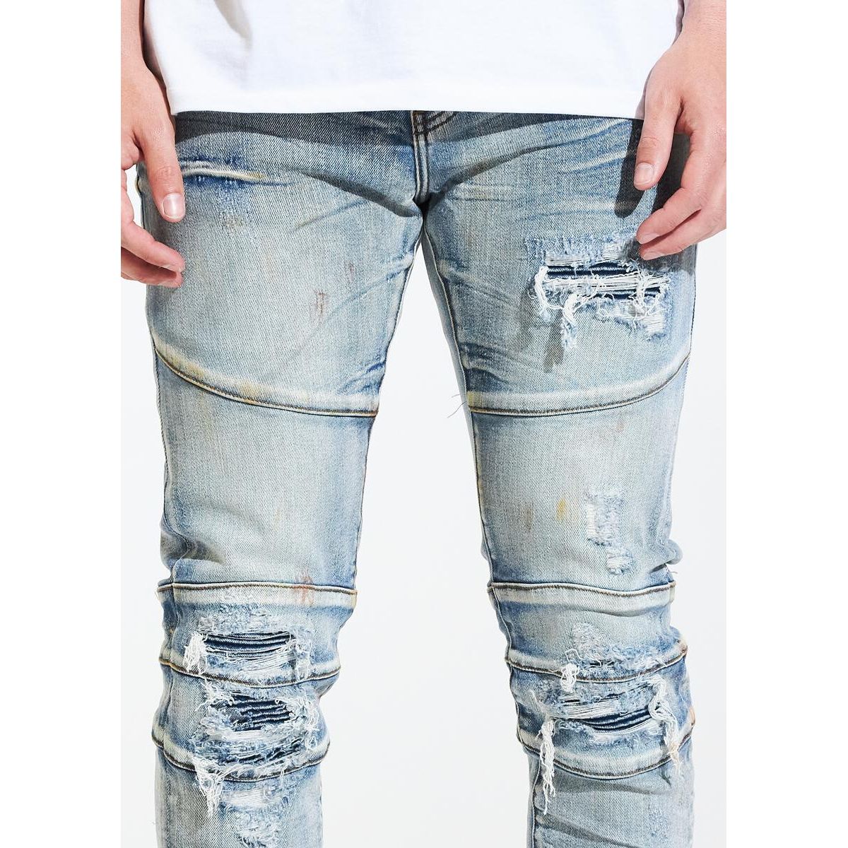 Close-up of distressed details on Crysp Denim Montana Blue Ripped Biker Jeans