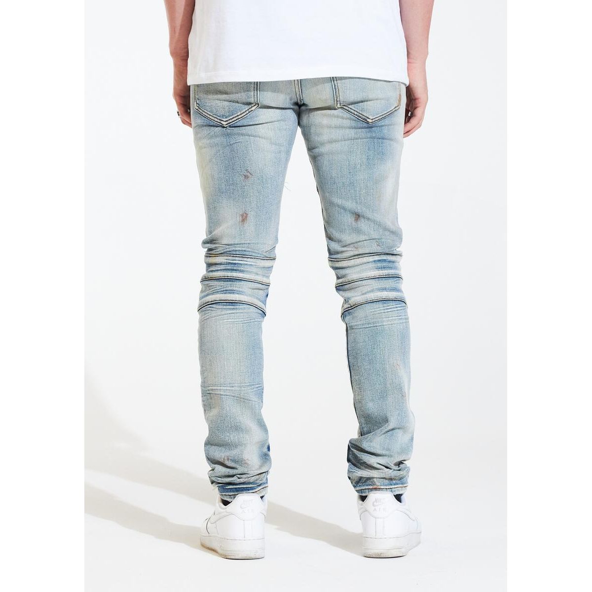 Close-up image of Crysp Denim Montana Blue Ripped Biker Jeans (CRYSPHOL21-9) showcasing distressed details and stylish design for men's fashion