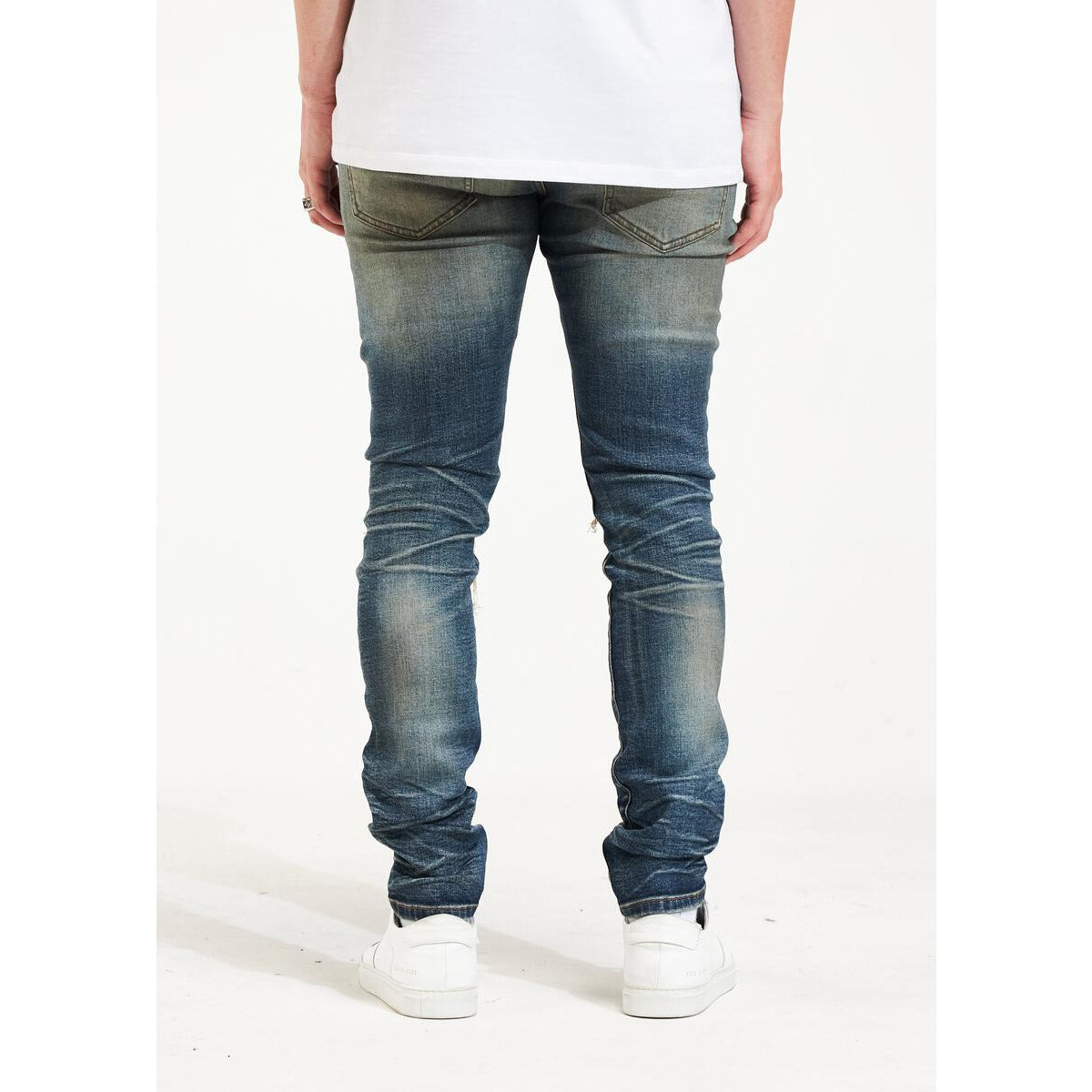 High-quality indigo rinse denim jeans with intricate embellishments