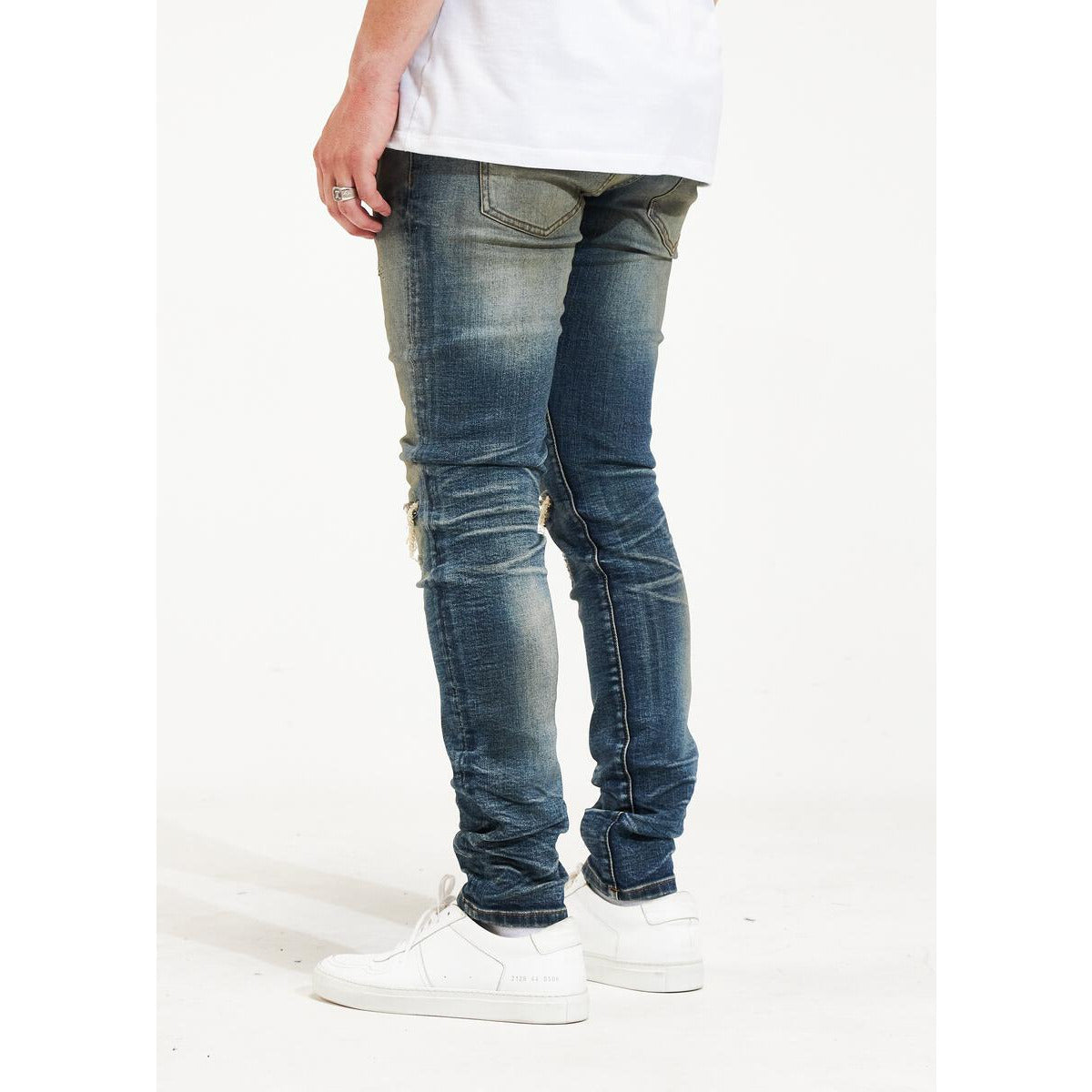EMBSP222-118 embellished denim jeans with faded finish and whiskering
