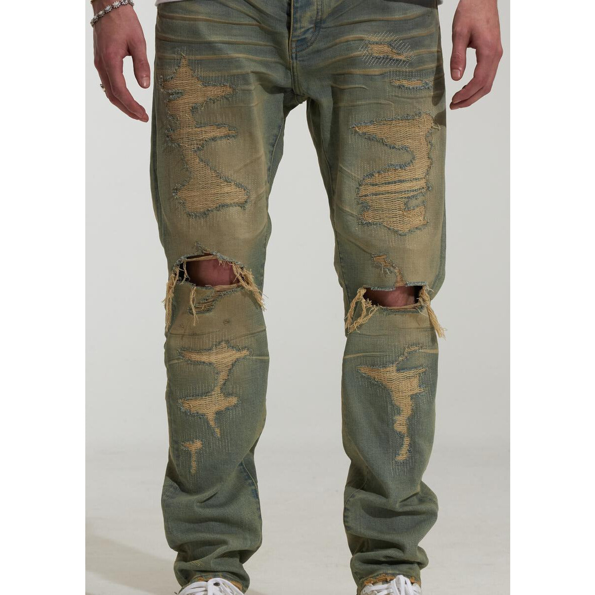 Back view of Embellish Criss Ripped Indigo Denim Jeans featuring pockets and signature label