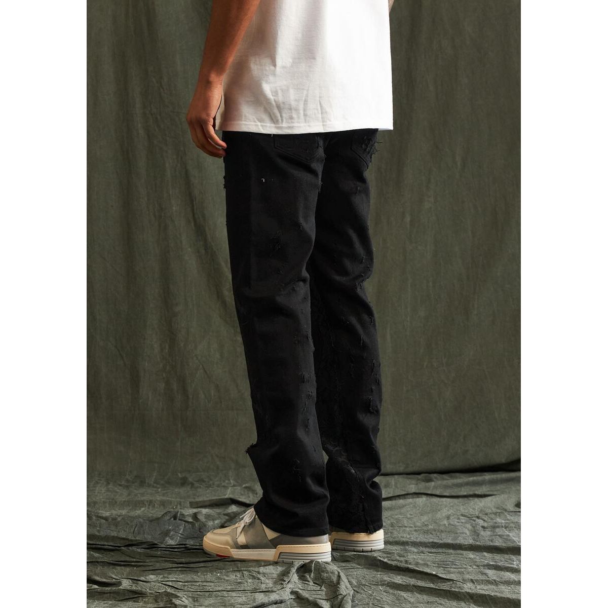 Embellish Urie Black Denim Jeans (EMBFALL123-046) with distressed detailing and slim fit