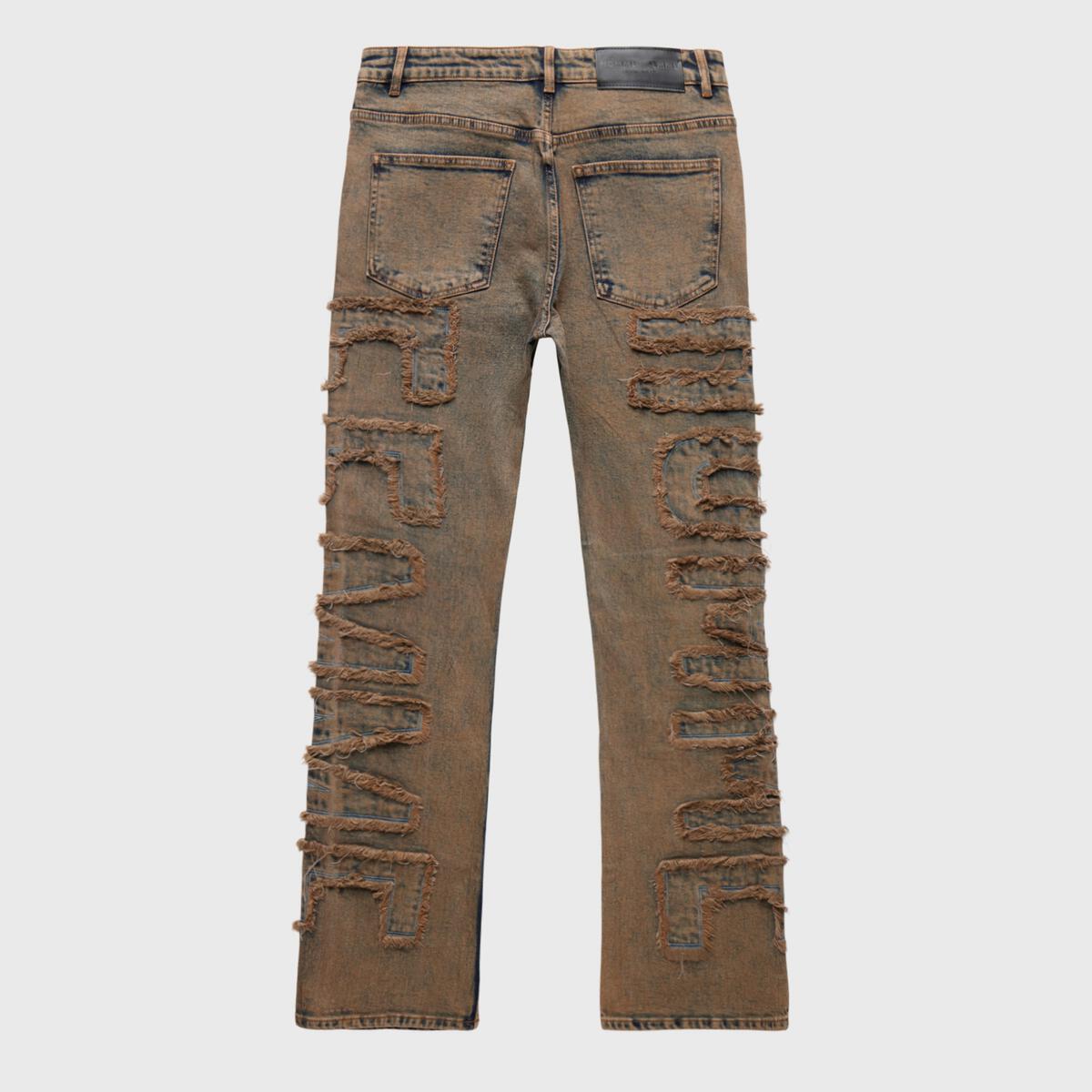 Pair of Homme + Femme Twilight Mocha Denim Jeans in stylish and versatile mocha color for men and women
