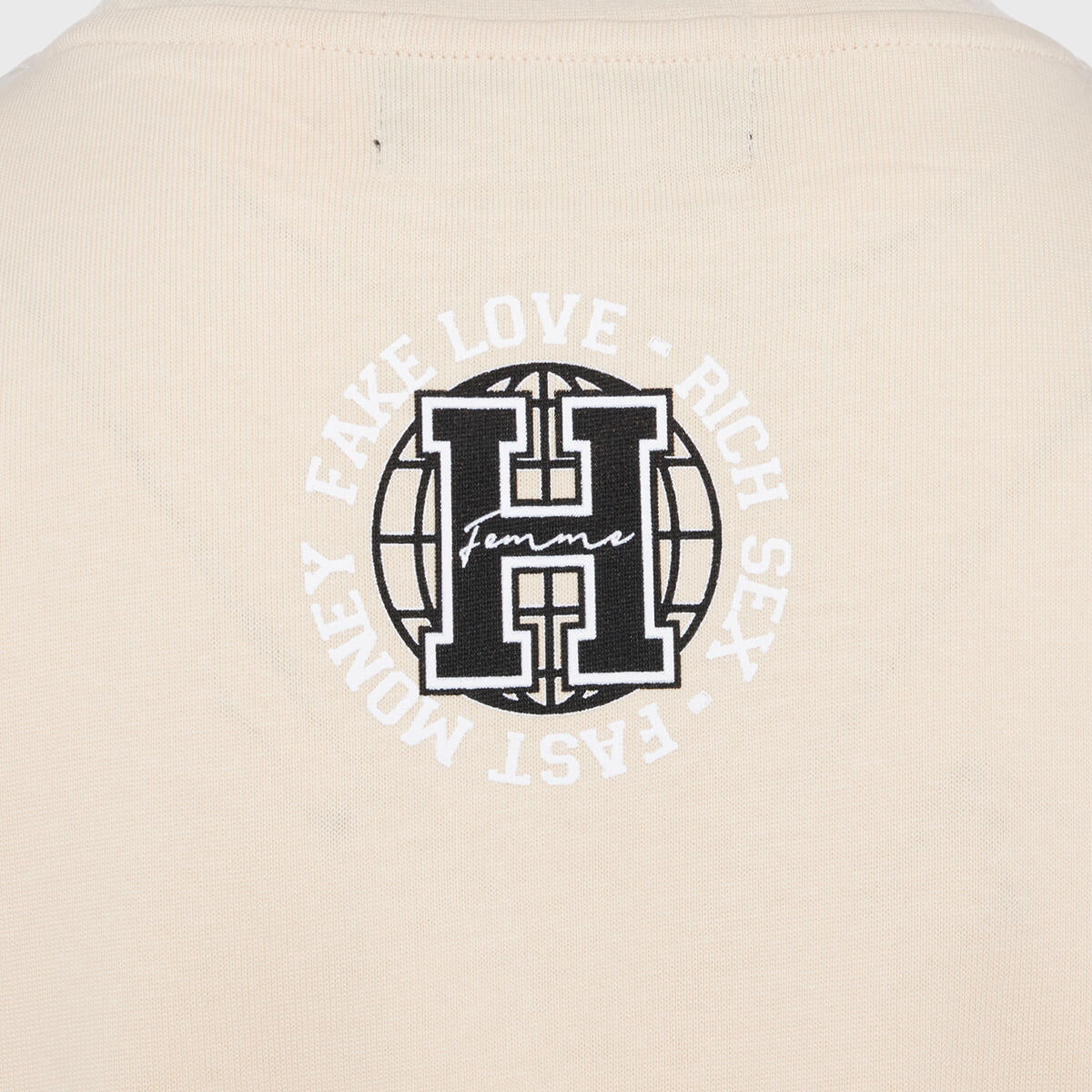Black tee with cream Homme + Femme logo on the back