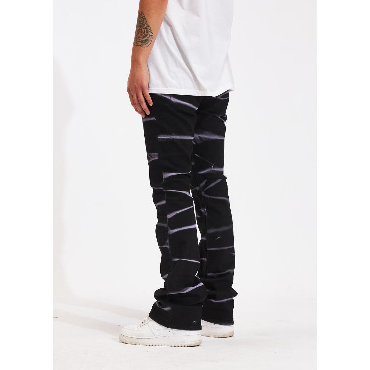 Crysp Denim Arch Black Flare Denim Jeans in various sizes and washes displayed on shelves