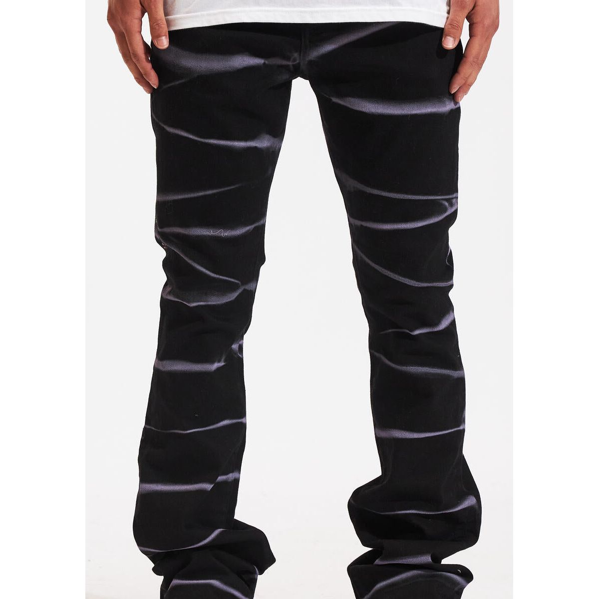 Black flare denim jeans featuring unique arch design by Crysp Denim