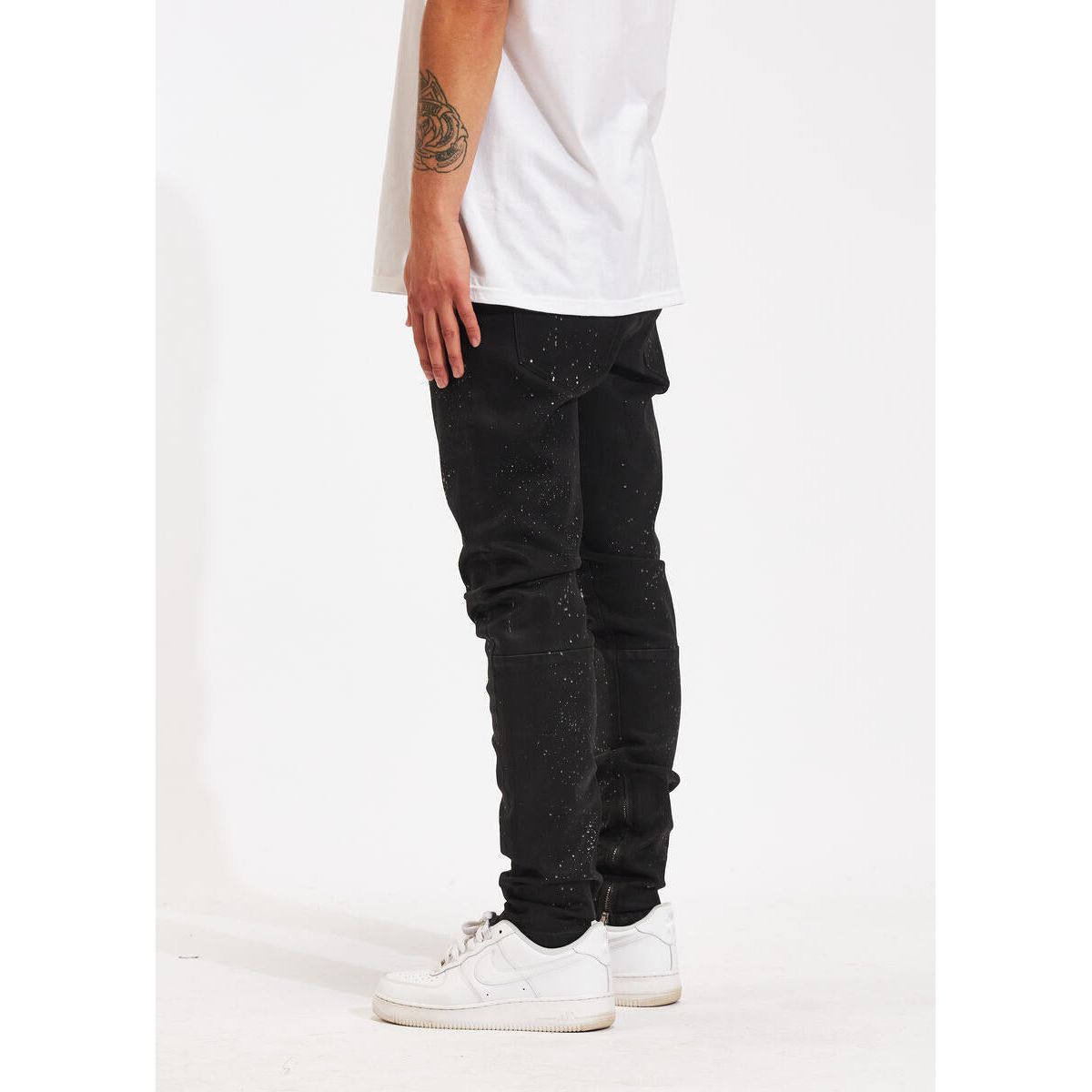 Crysp Denim Atlantic Black Paint Denim Jeans (CRYSPHOL23-14) laid flat showcasing the faded black wash and paint details