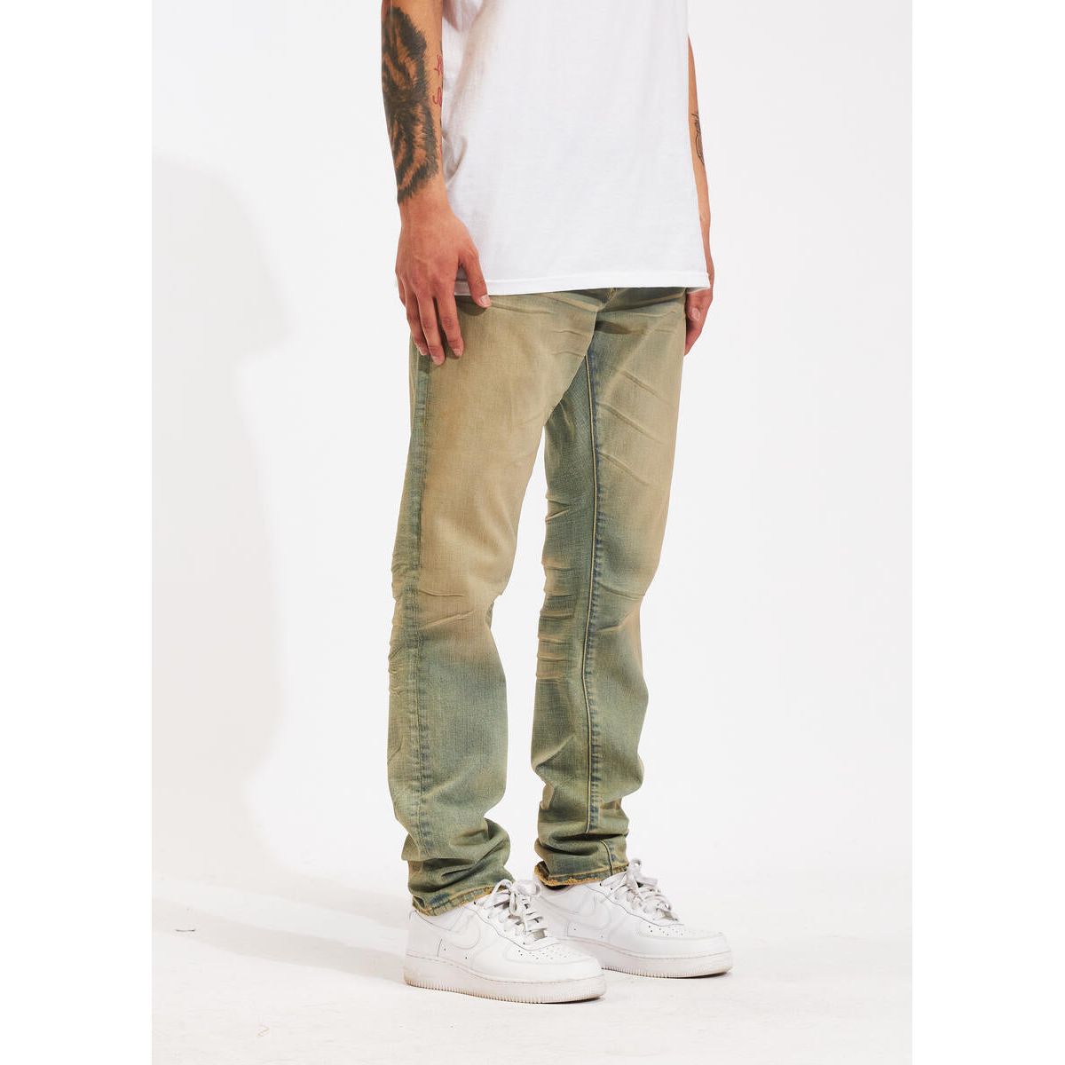 Close-up of the Crysp Denim Atlantic Sand Wash Denim Jeans (CRYSPHOL23-17) showing the high-quality stitching and unique texture of the fabric