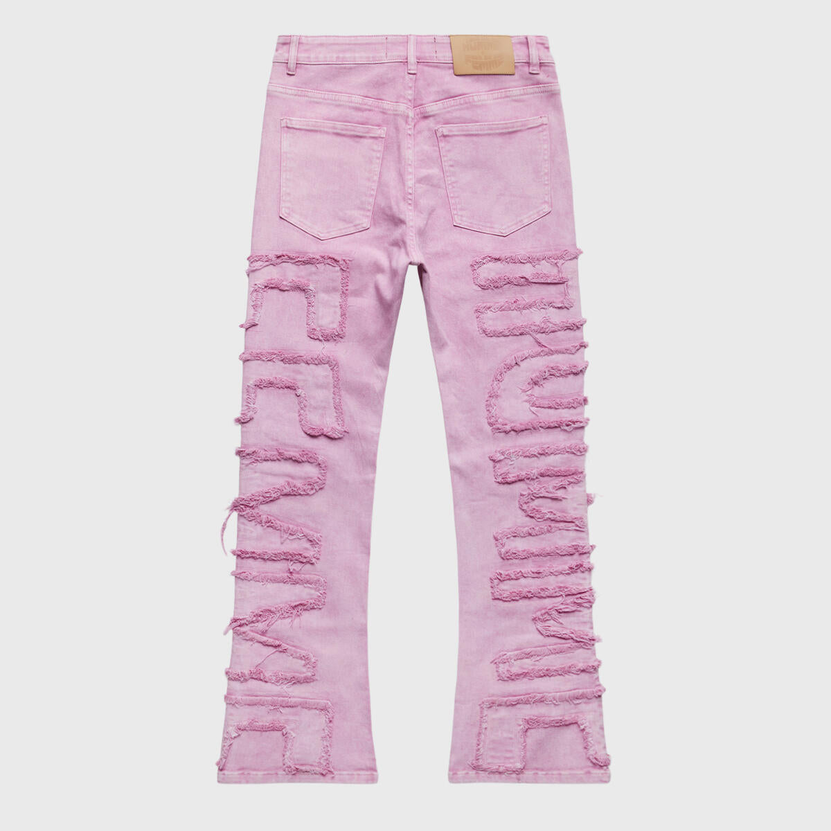 Close-up of Homme + Femme Twilight Pink Denim Jeans on model's waist