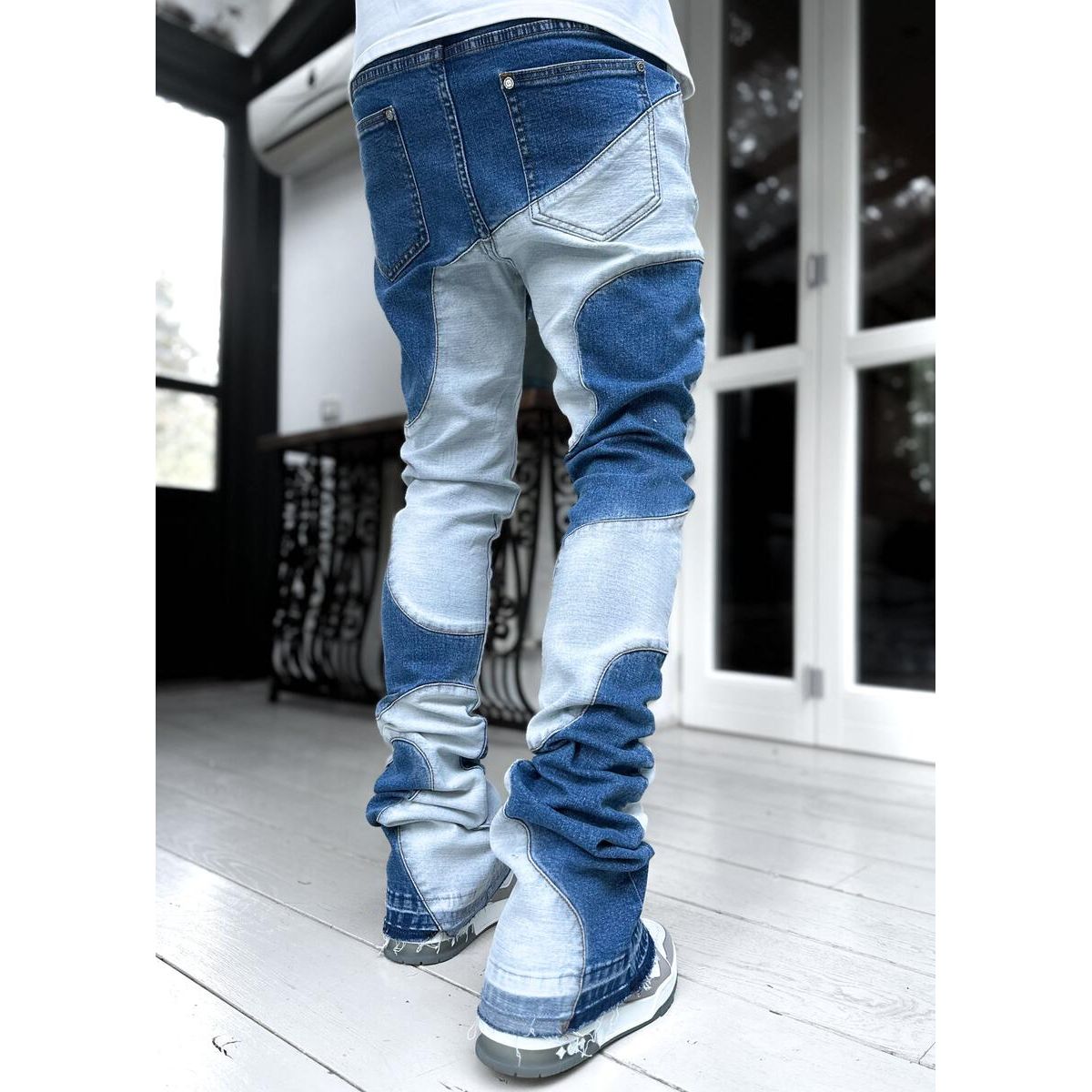 Guapi Vintage Blue Wavy Denim displayed on a clothing rack with other vintage-inspired denim styles