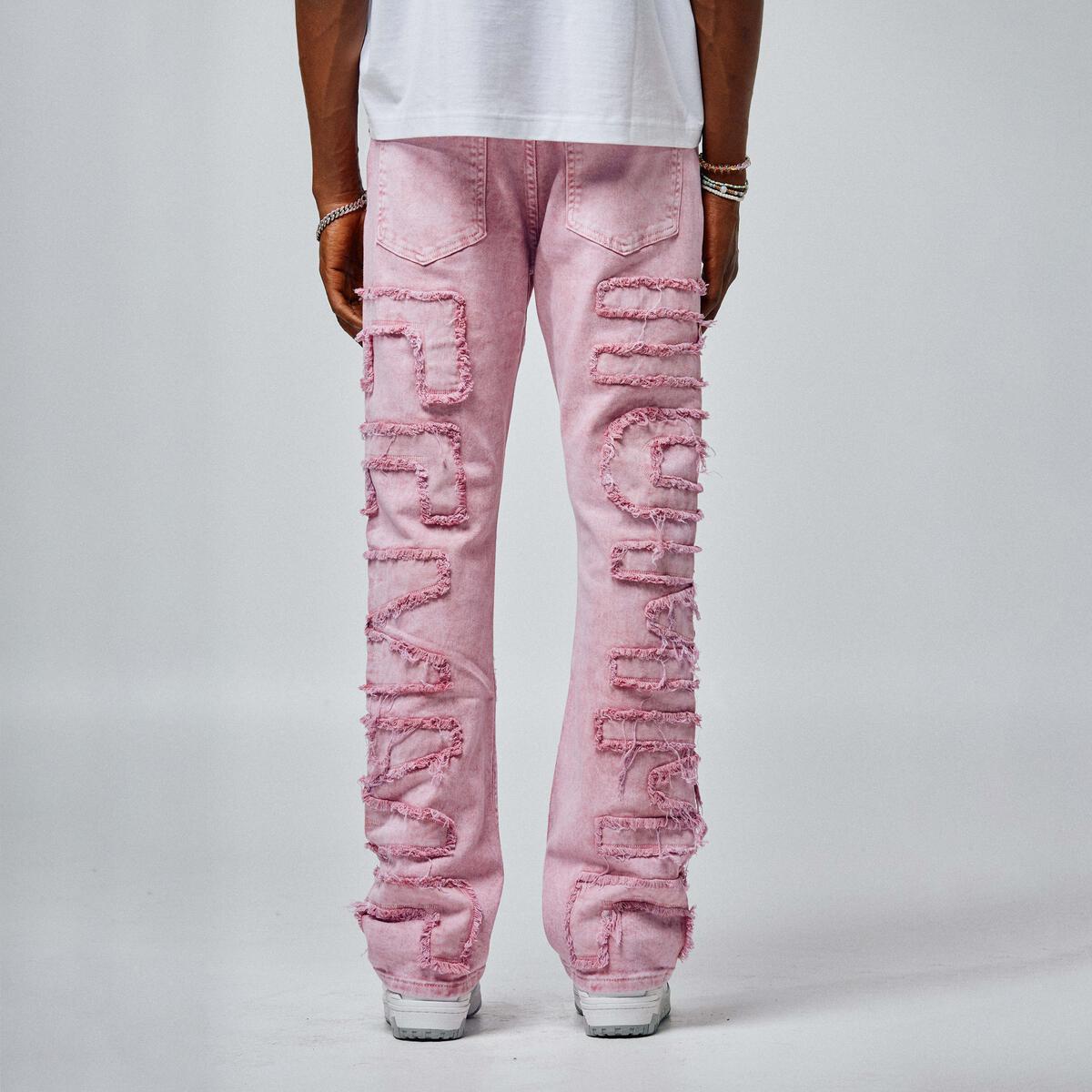 Back view of Homme + Femme Twilight Pink Denim Jeans on female model walking