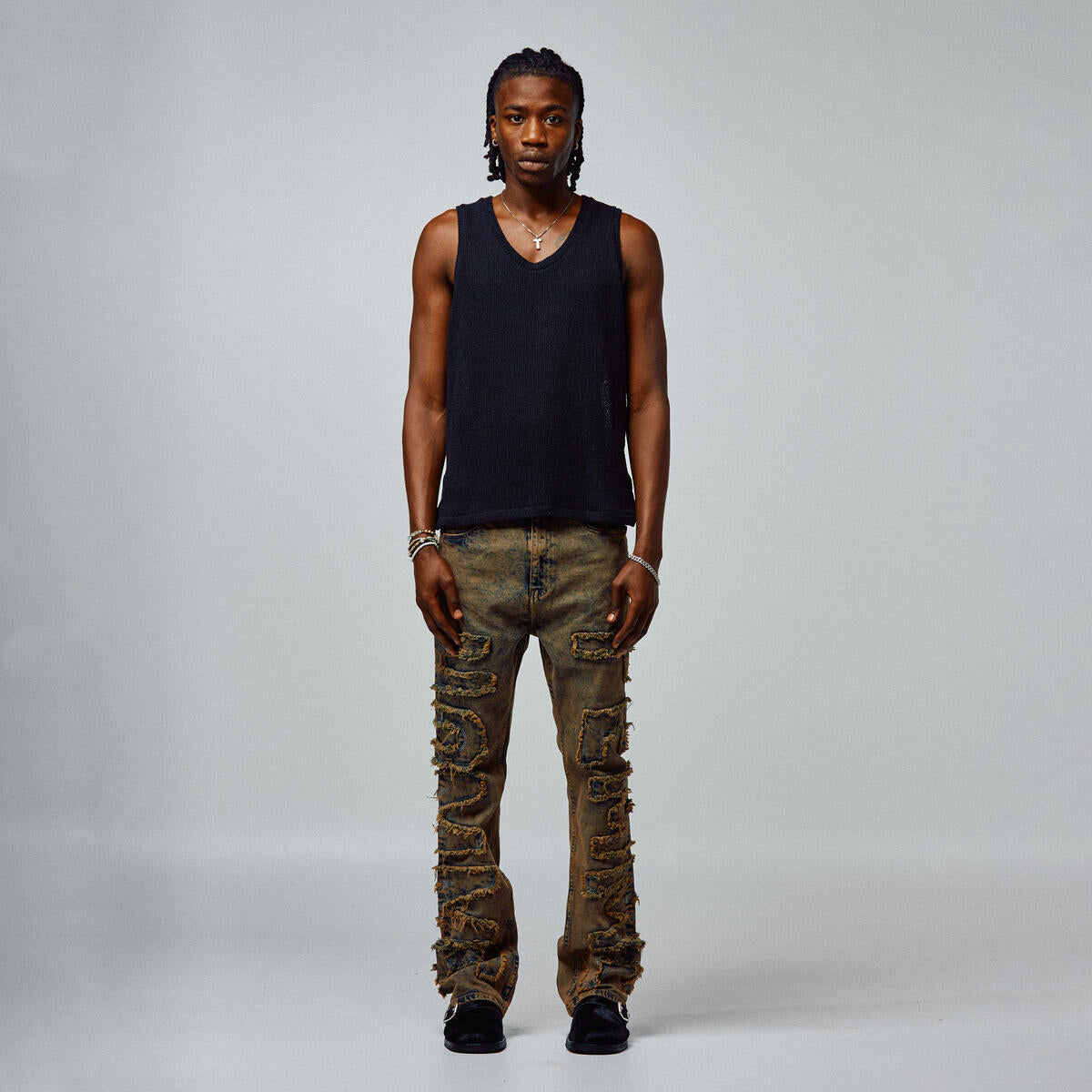Close-up image of Homme + Femme Twilight Mocha Denim Jeans, featuring a washed mocha color and stylish distressed detailing, perfect for casual and trendy everyday wear