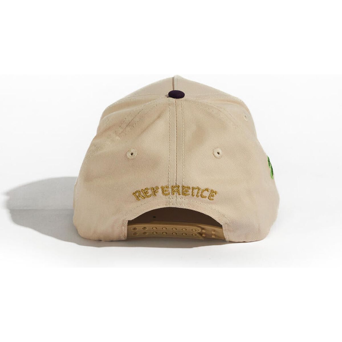 Cream and purple snapback hat featuring the Paradise LA logo