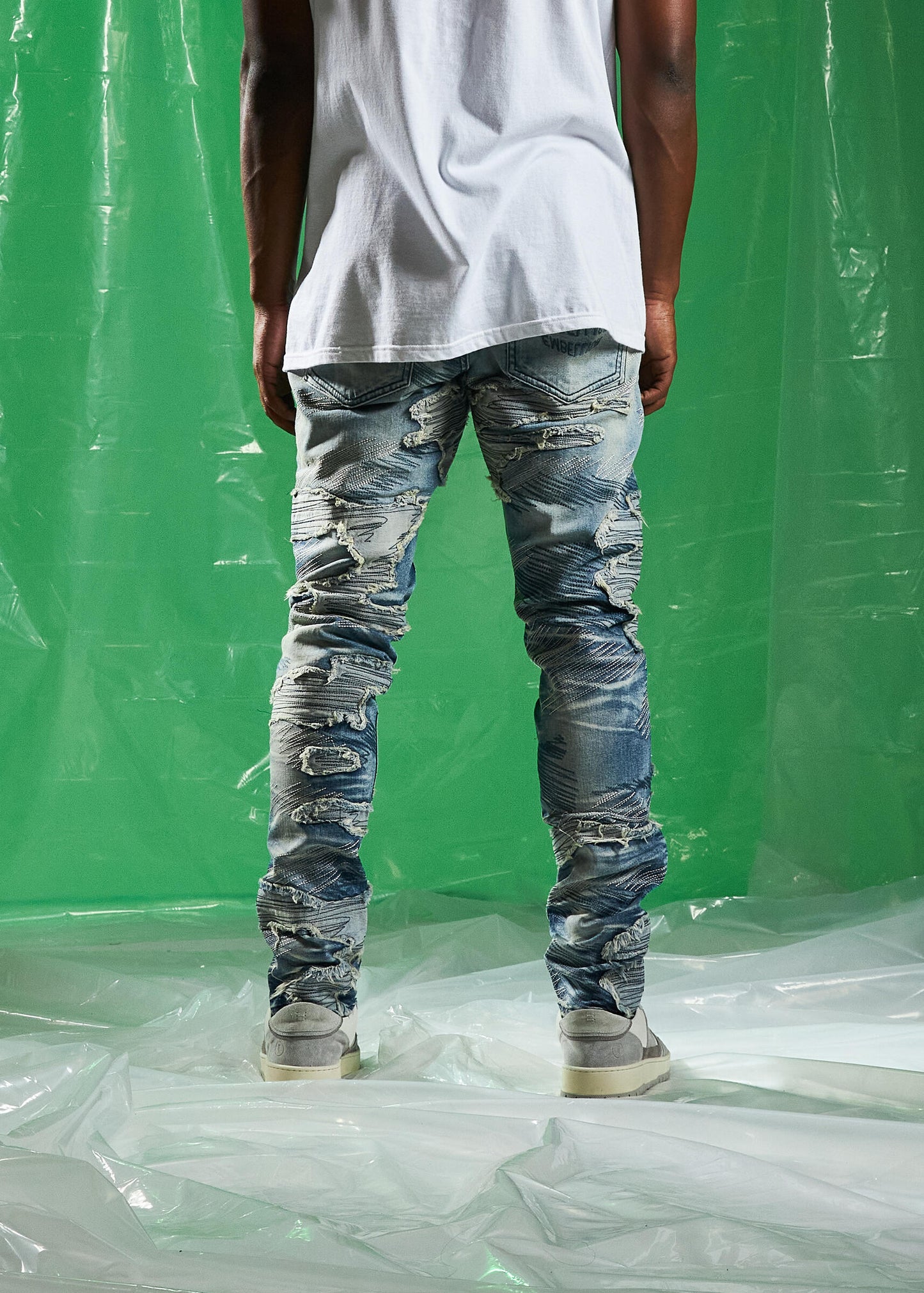 Embellish Colt Mid Blue Ripped Denim Jeans with distressed detailing and frayed hem