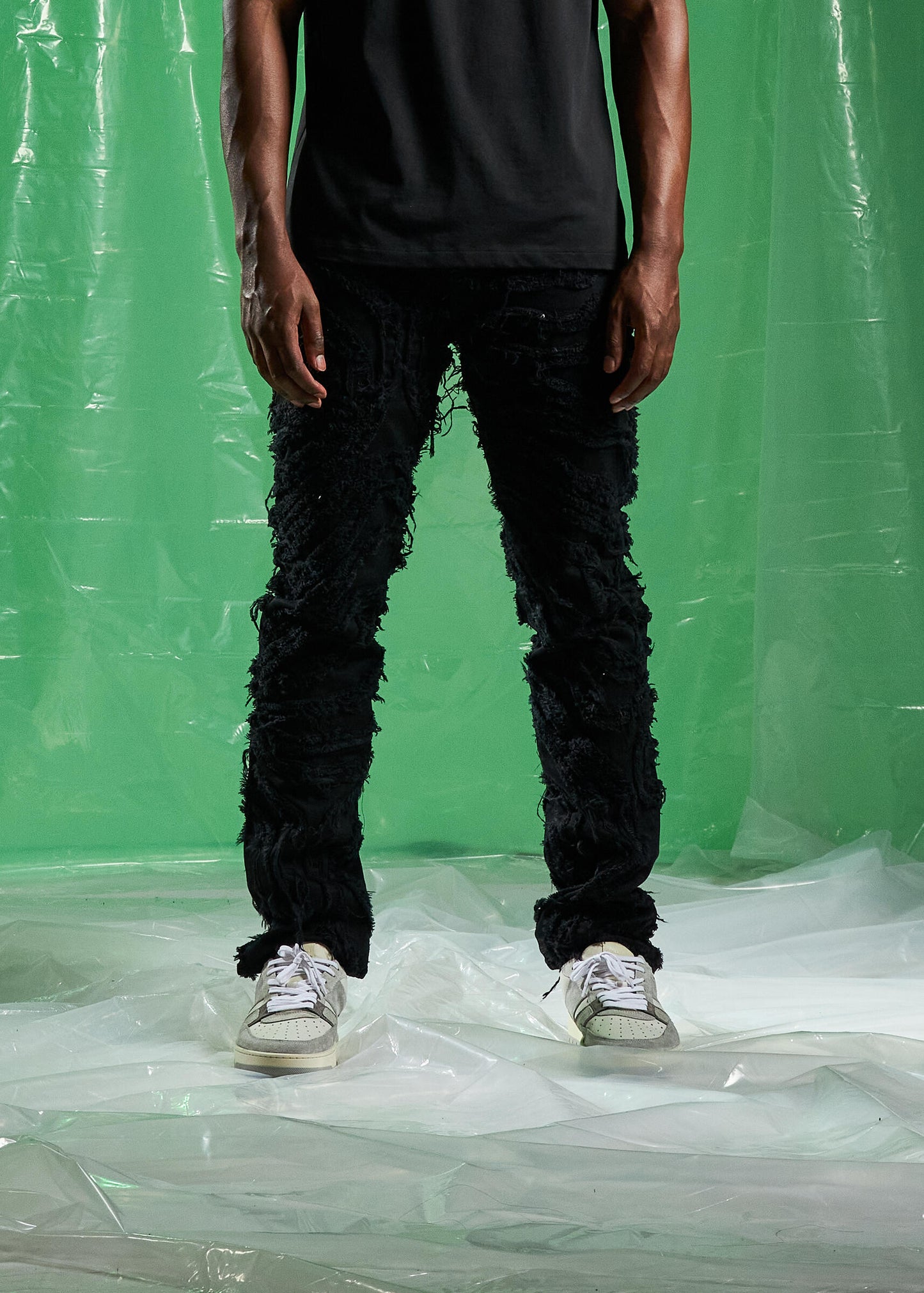 Embellish Jenson Black Ripped Denim Jeans side view with frayed hem