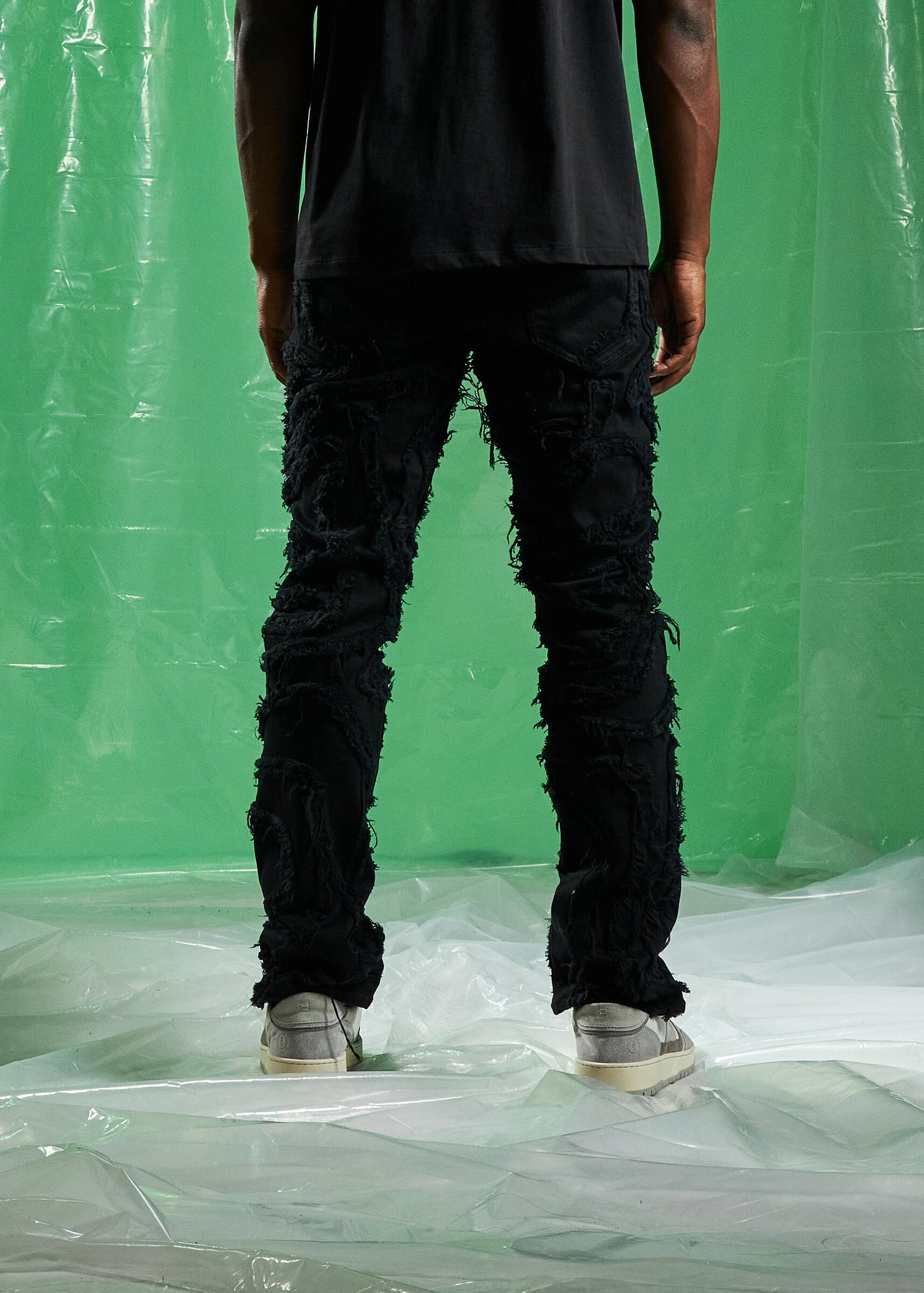 Embellish Jenson Black Ripped Denim Jeans on model showing fit and style