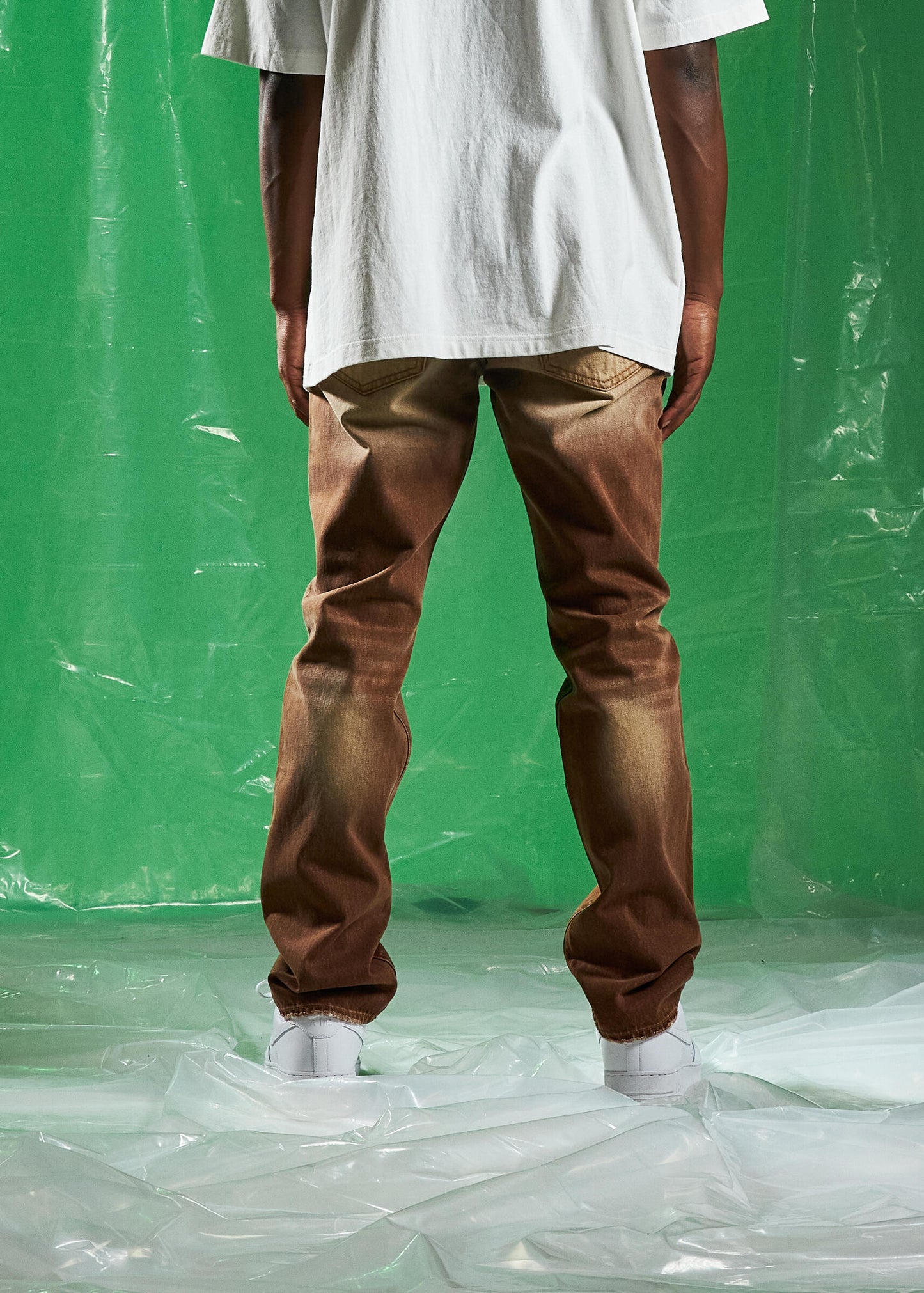Embellish Saddle Tabacco Wash Denim Jeans (EMBSPR24-042) featuring distressed detailing and a rich, earthy tone