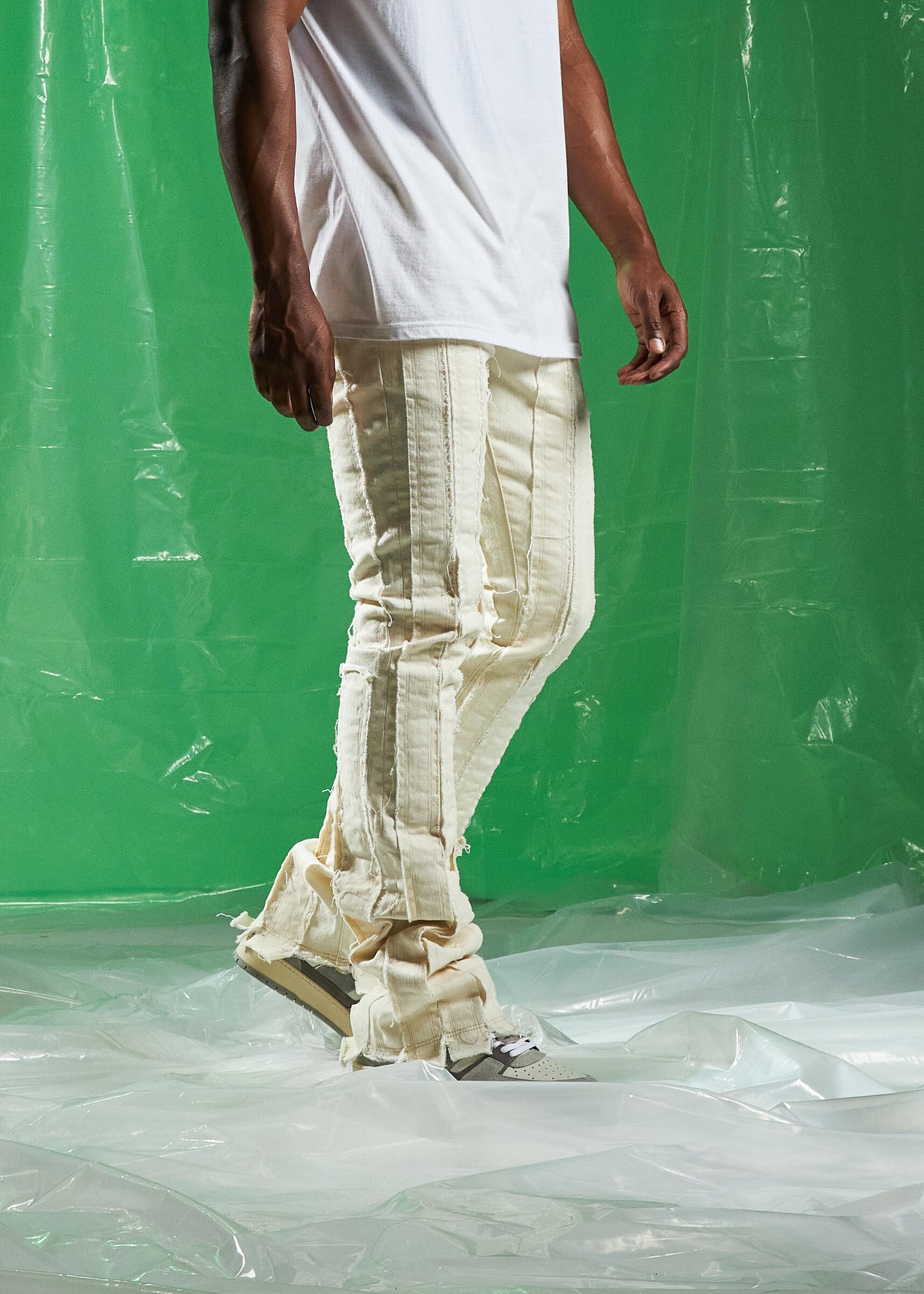 Fashionable Embellish Ursus Cream Denim Jeans (EMBSPR24-026) with stylish distressing and cool frayed edges