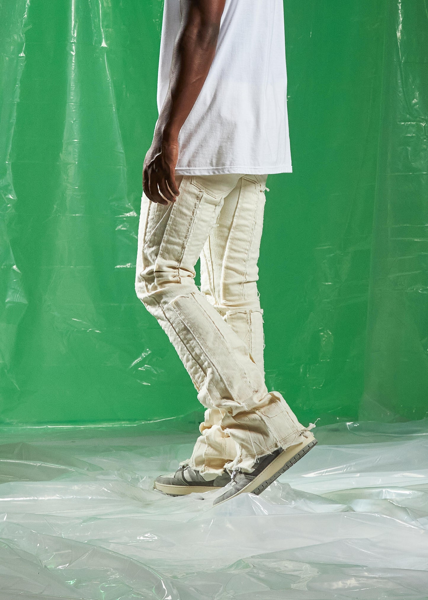 Embellish Ursus Cream Denim Jeans with a focus on the button and zipper details