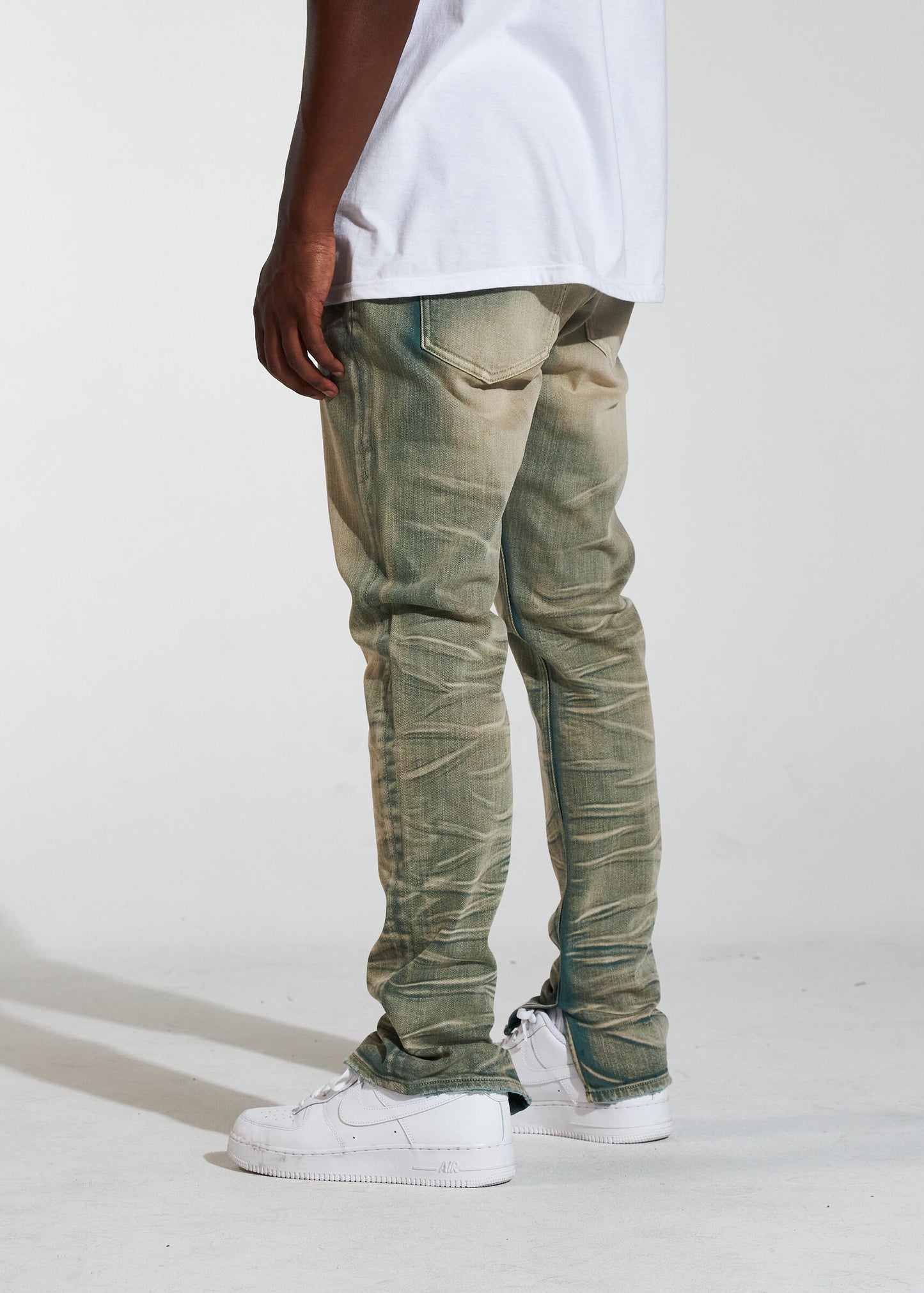 Fashionable and versatile Crysp Denim Arch Dark Sand Wash Stacked Denim Jeans (CRYSPR241-009) worn with sneakers and a hoodie