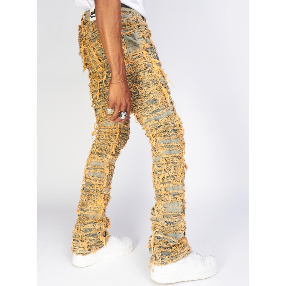 Dark vintage Politics Jeans with thrashed and distressed details and stacked flare, style Debris510, back view