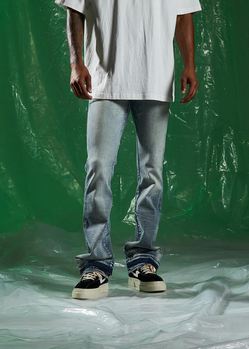 Embellish Nixon Stonewash Denim Jeans (EMBSPR224-032) side view, high-quality stonewashed denim, and stylish logo patch