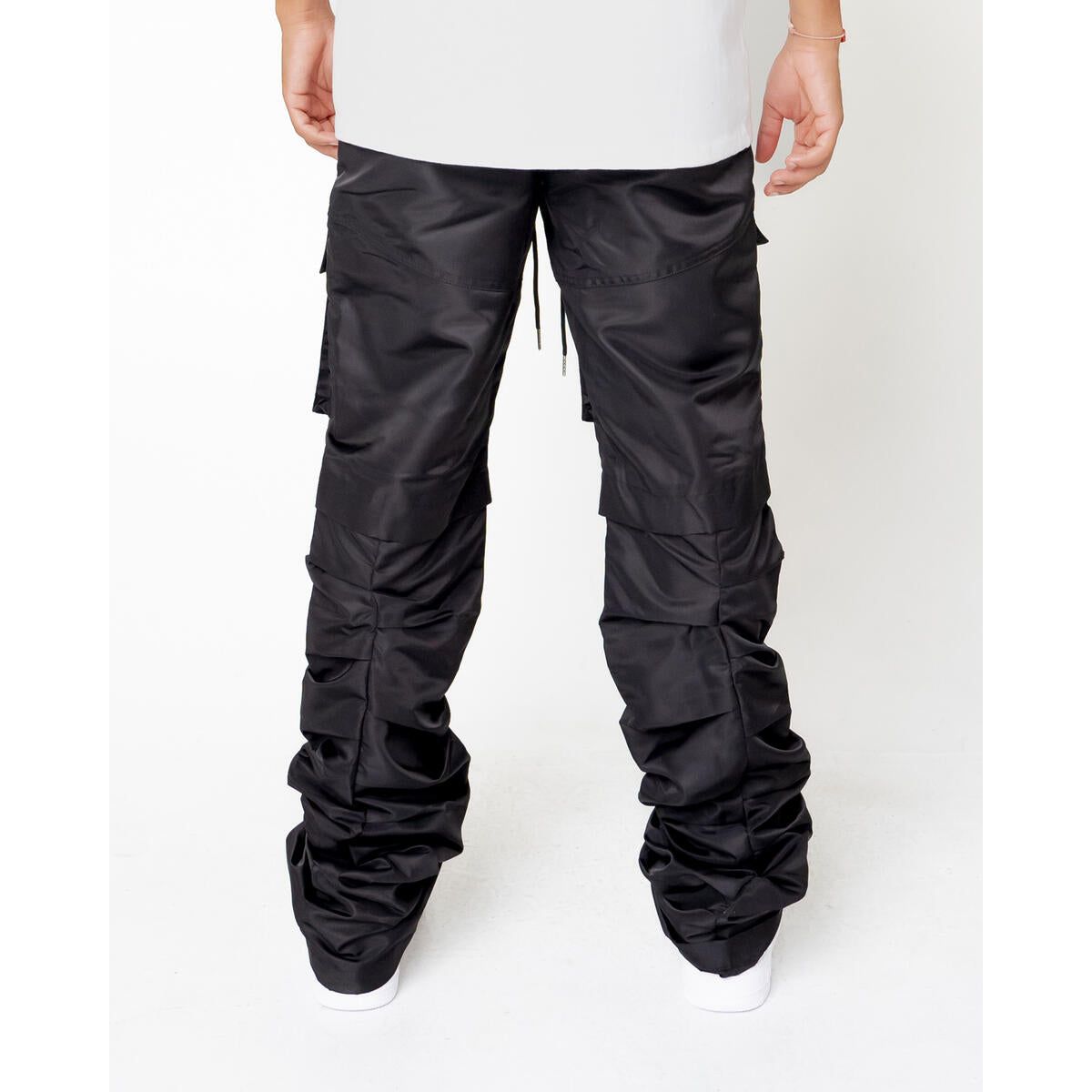Close-up of EPTM Stacked Flare 40 Pants fabric texture in black