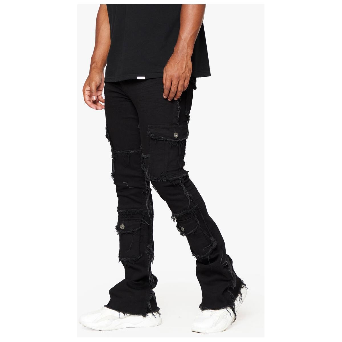 Valabasas Aegerine Jet Black Stacked Flare Denim styled with a leather jacket and ankle boots for a trendy look