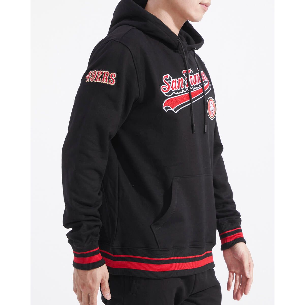 Pro Standard San Francisco 49ers Script Tail Rib Hoodie in black, red, and black colorway with team logo and script design