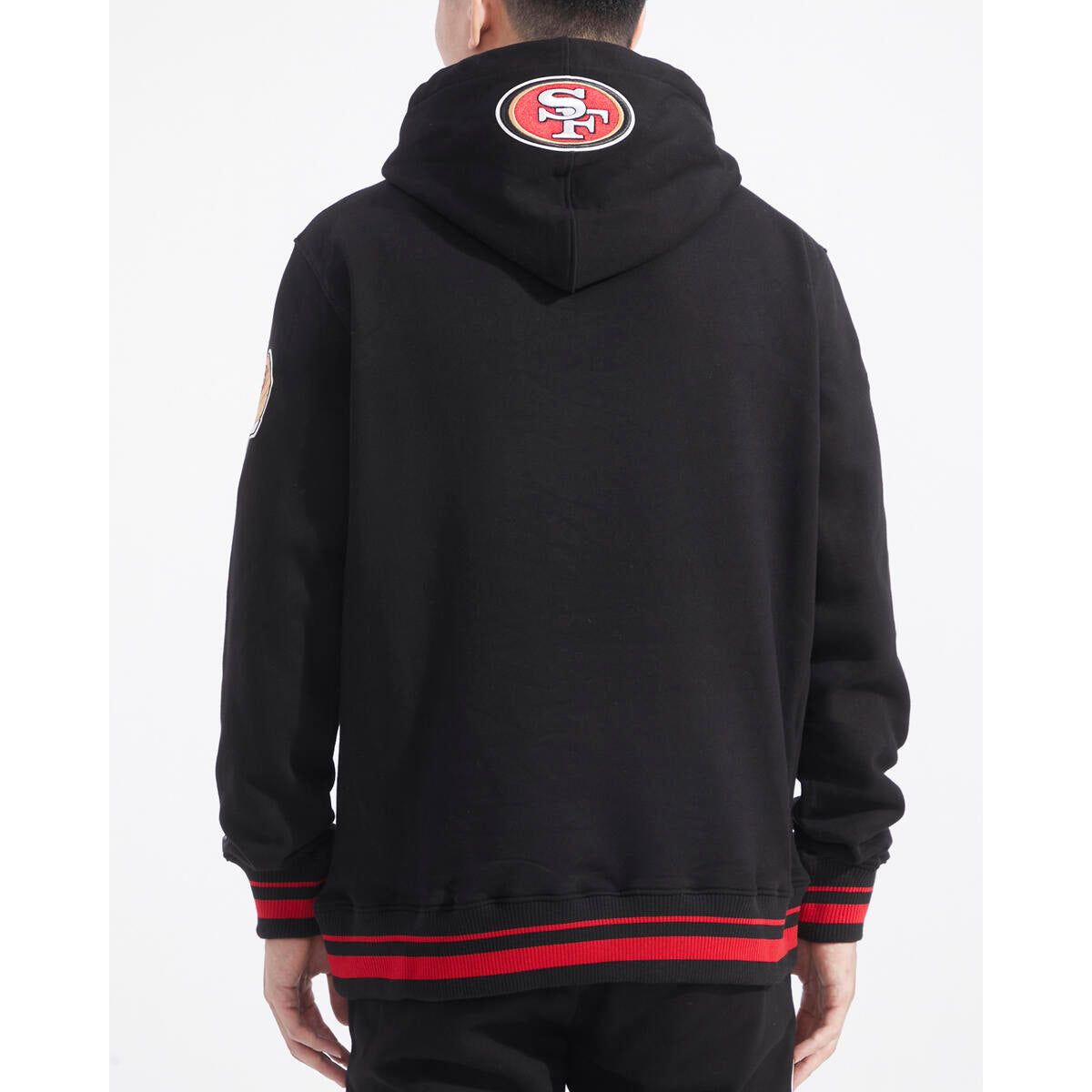 Close-up of the hoodie's ribbed texture and detailed stitching, highlighting the quality and craftsmanship