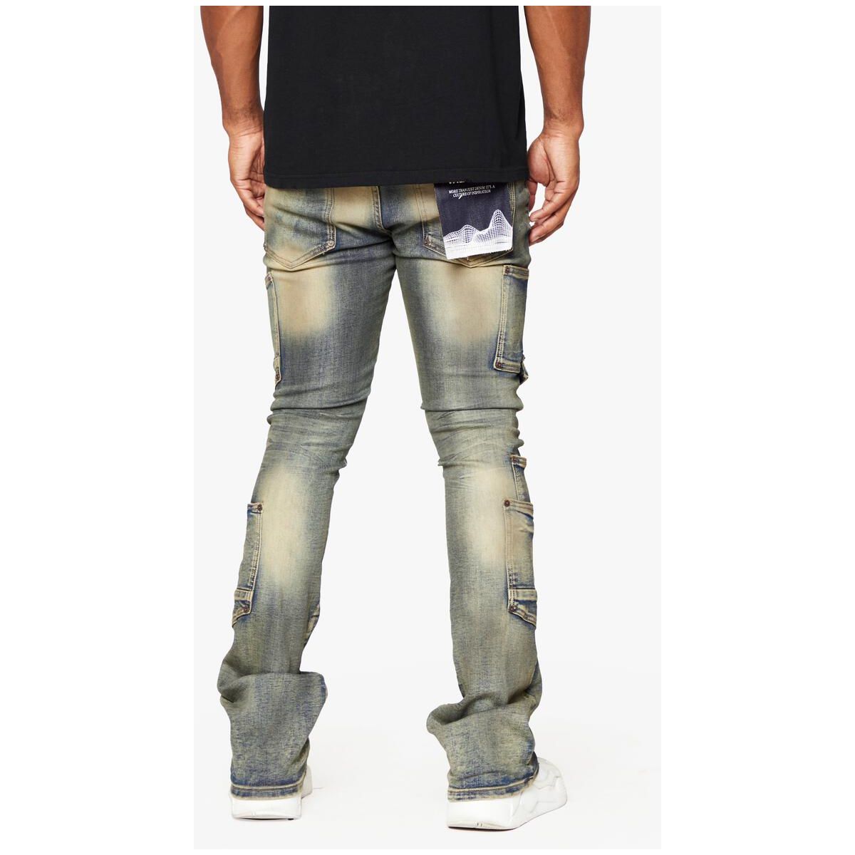 Close-up of the vintage wash and distressing on Valabasas Pocros Stacked Flare Denim