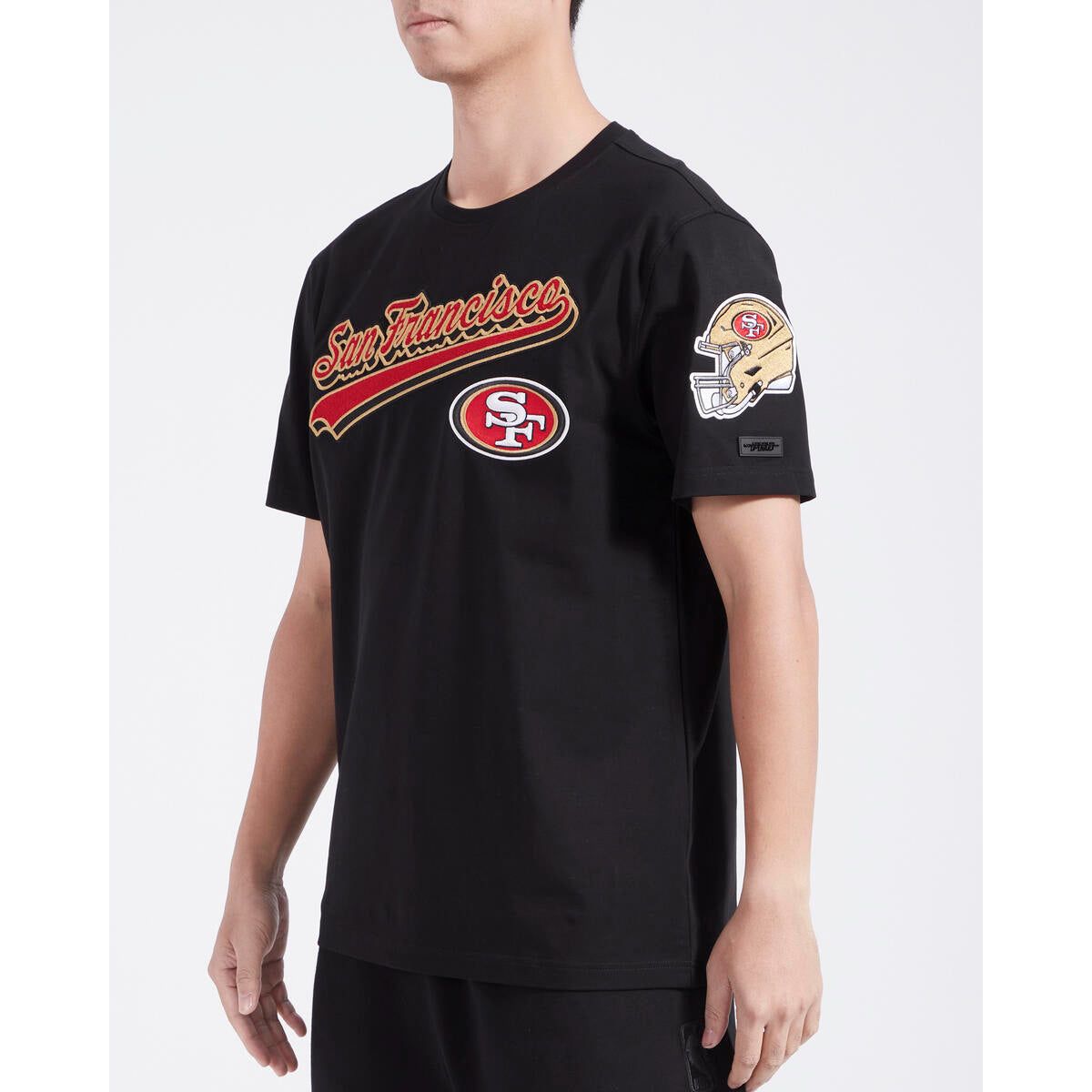 Front view of the black San Francisco 49ers Script Tail SJ Tee showcasing the detailed team branding and classic fit