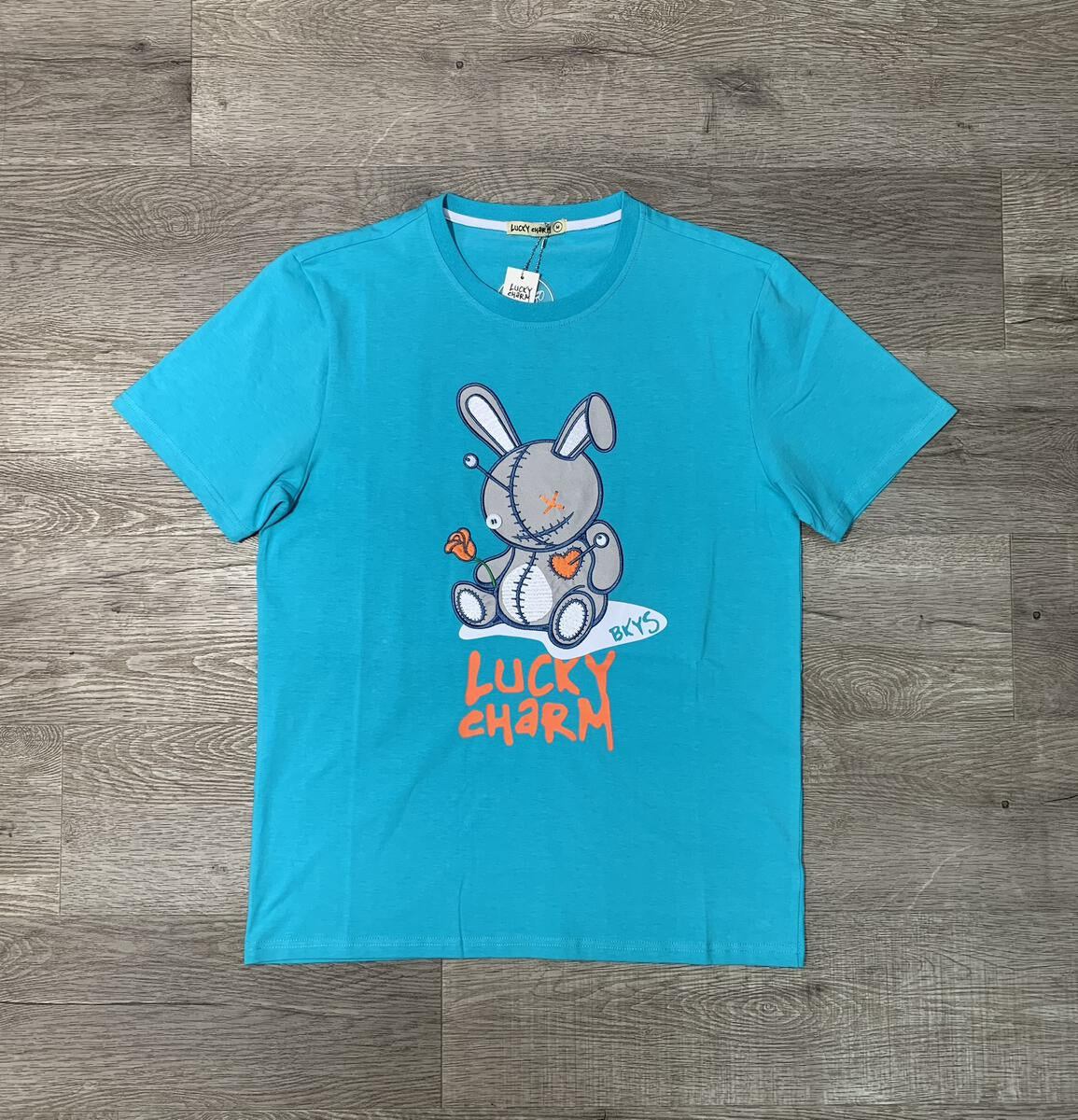 Black Keys Lucky Charm Miami Blue Tee (T934) - Men's graphic t-shirt with lucky charm design in vibrant blue color