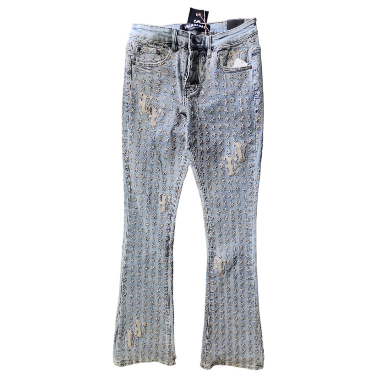 Woman wearing Valabasas Asterisk Light Vintage Blue/Cream Stacked Flare Jean with a stylish top and accessories, showcasing the fit and style