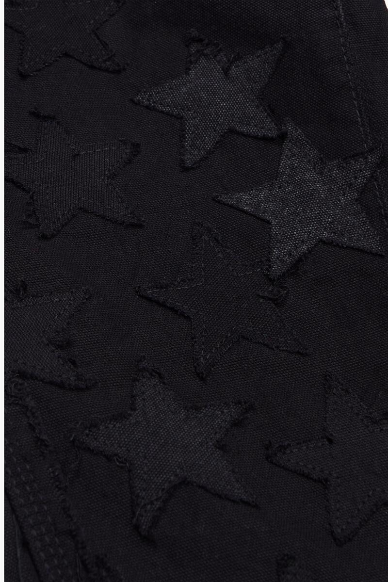 Model wearing Valabasas V-Stars Black Stacked Flare Denim Jeans with a stylish and trendy look