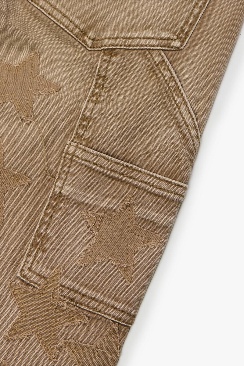 Valabasas V-Stars Dark Grey Wash Stacked Flare Denim Jeans styled with boots and a leather jacket for a trendy look