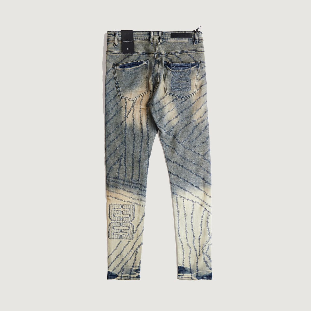 EMBSUM24-001 product image of men's denim jeans in desert wash color