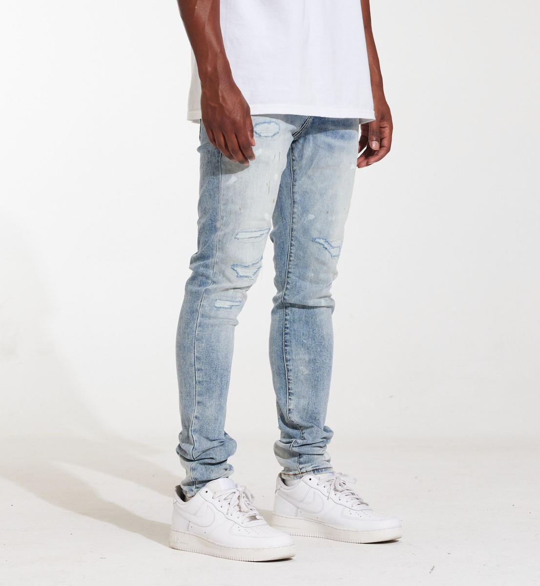 Back view of Crysp Denim Atlantic Light Paint Denim Jeans (CRYSPSUM24-028) featuring signature logo patch