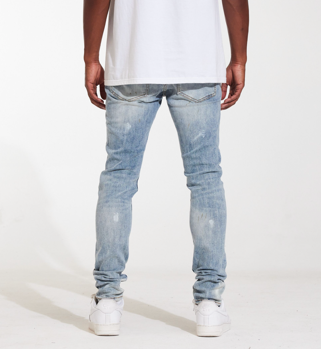 Crysp Denim Atlantic Light Paint Denim Jeans back view with frayed hem