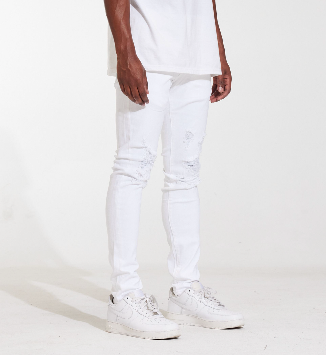 Close-up of the distressed details on Crysp Denim Atlantic White Jeans