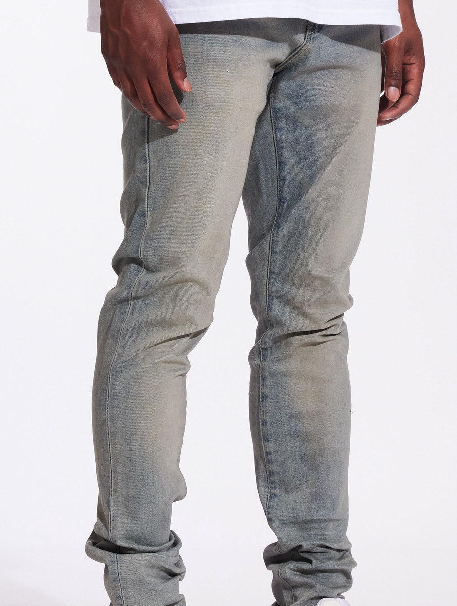 Crysp Denim Atlantic Pacific Wash Denim Jeans, a stylish and versatile wardrobe essential, features a medium wash and distressed detailing for a modern and edgy look