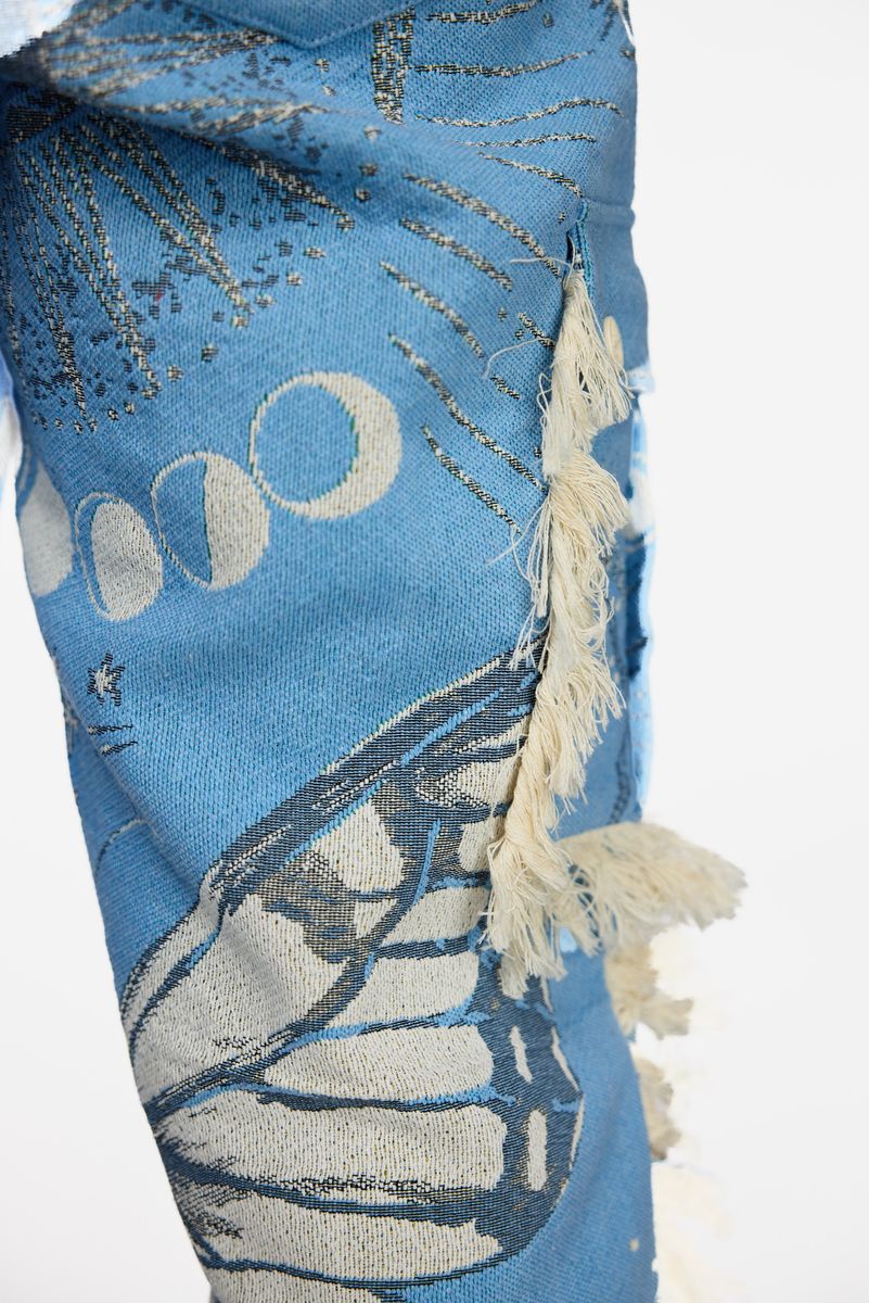 Guapi Aqua Blue Tapestry Pants: Stylish and comfortable bohemian-inspired bottoms in a vibrant aqua blue color with intricate tapestry design