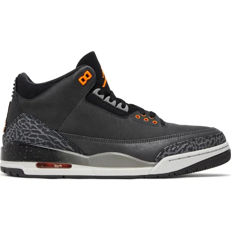 Black and grey Jordan 3 Retro - Fear Pack (2023) shoe with orange accents and signature Jumpman logo on the heel