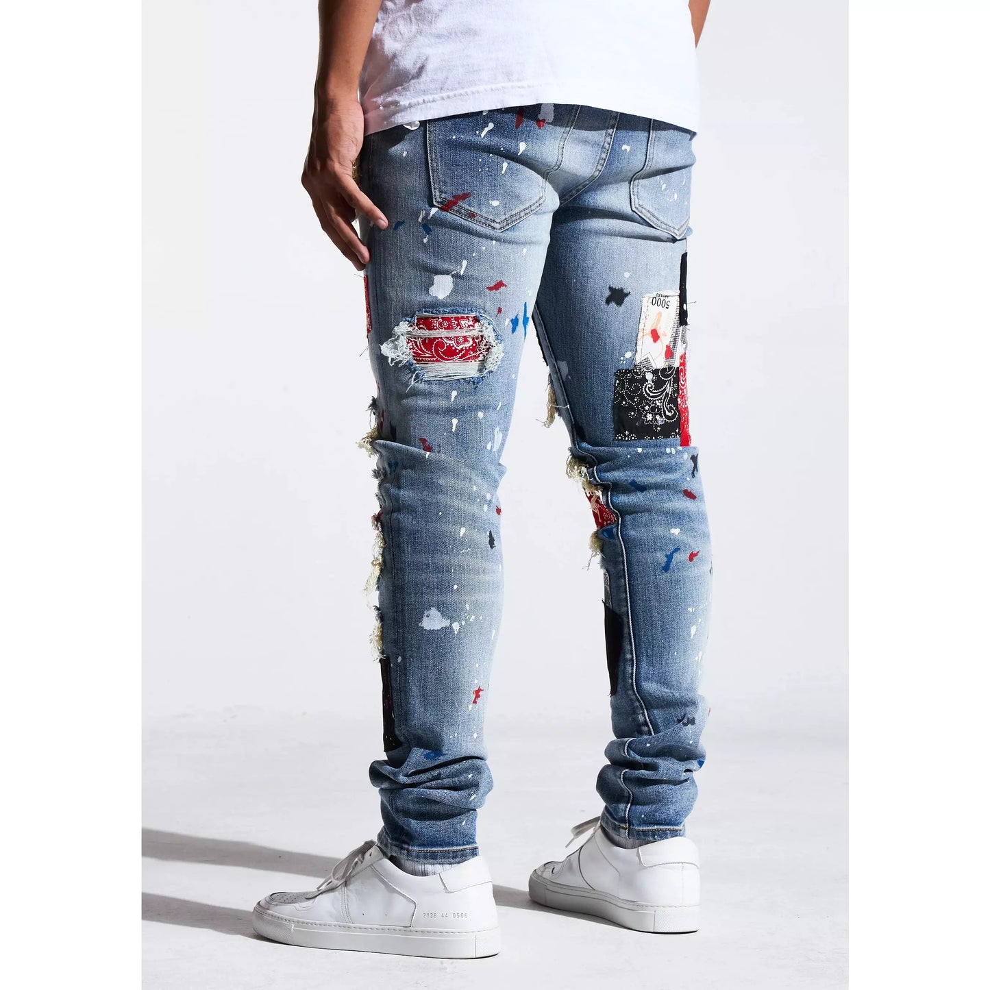 High-quality Embellish Blue Patchwork Rebel Rip & Repair Denim Jeans (EMBSP121-112) with intricate stitching and distressed elements