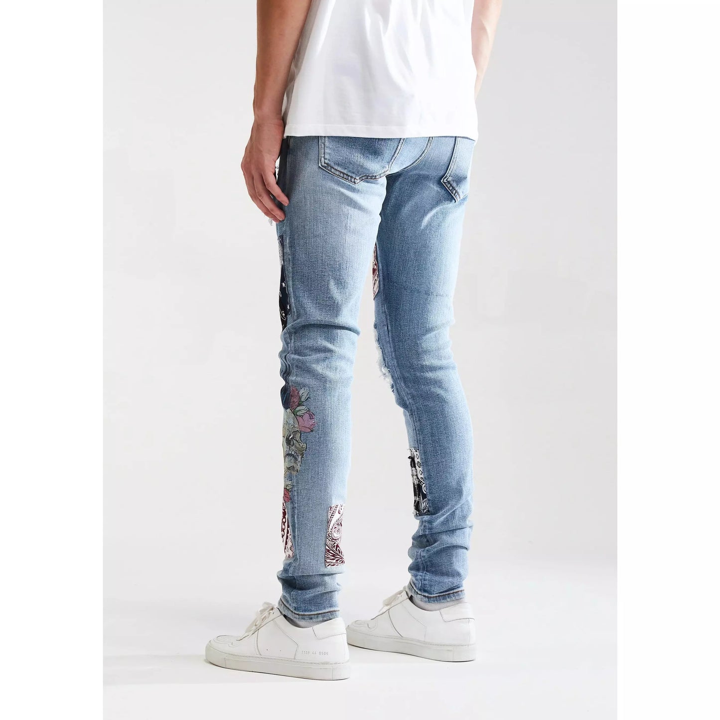 Embellish Arcadia Blue Patchwork Denim Jeans side view with ripped and repaired details