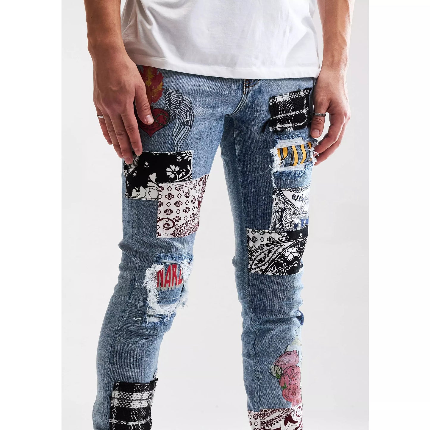Close-up of back pockets of Embellish Arcadia Blue Patchwork Denim Jeans (EMBSUM121-105) with embroidered design