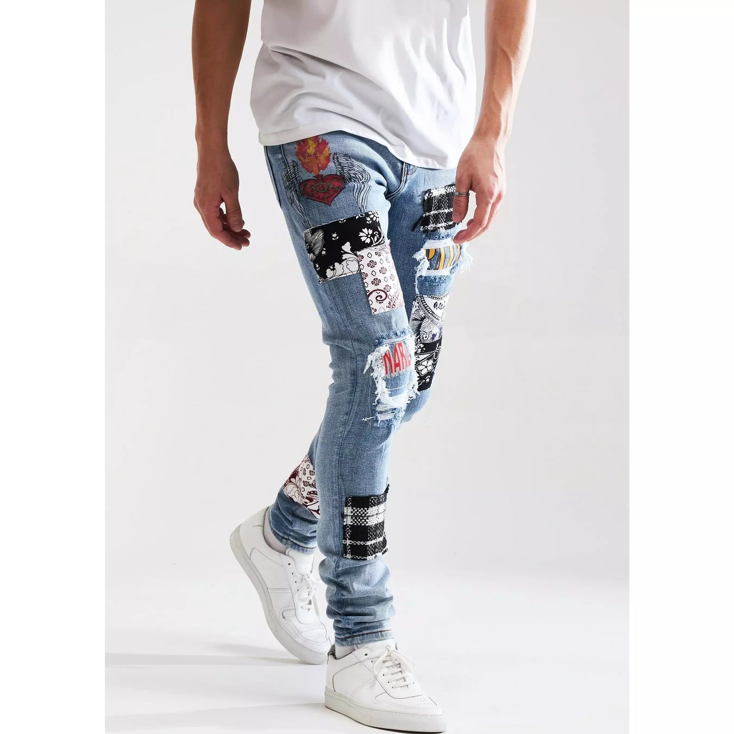 High-quality image of the denim fabric and texture of Embellish Arcadia Blue Patchwork Denim Jeans (EMBSUM121-105)