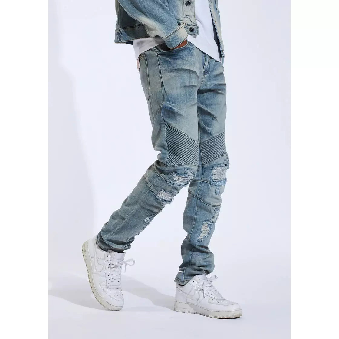Side view of Crysp Skywalker Light Blue Biker Denim Jeans (CRYSPHOL21-1) highlighting moto-style ribbed panels