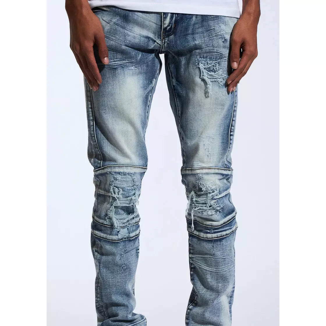 Close-up of the tears and distressing on the front of Crysp Kurt Blue Biker Denim Jeans